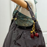 Coach Plum Patent Leather Maggie Bag