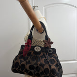 Black Optic Signature Coach Garnett Turnlock Bag