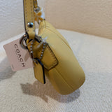 NWT Coach Butter Yellow Pochette Bag