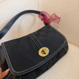 Coach Black Signature Turnlock Ergo Flap Bag