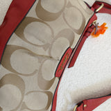 Brown Coach Signature Shoulder Bag with Orange Trim