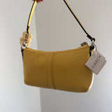 NWT Coach Butter Yellow Pochette Bag