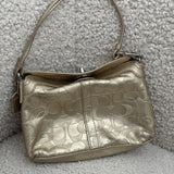 Gold Legacy Turnlock Coach Signature Mini Bag
