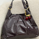 Coach Plum Patent Leather Maggie Bag