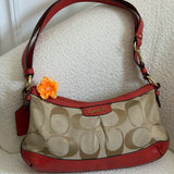 Brown Coach Signature Shoulder Bag with Orange Trim