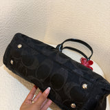 Black Optic Signature Coach Garnett Turnlock Bag