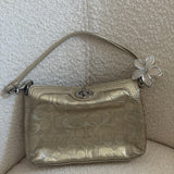 Gold Legacy Turnlock Coach Signature Mini Bag