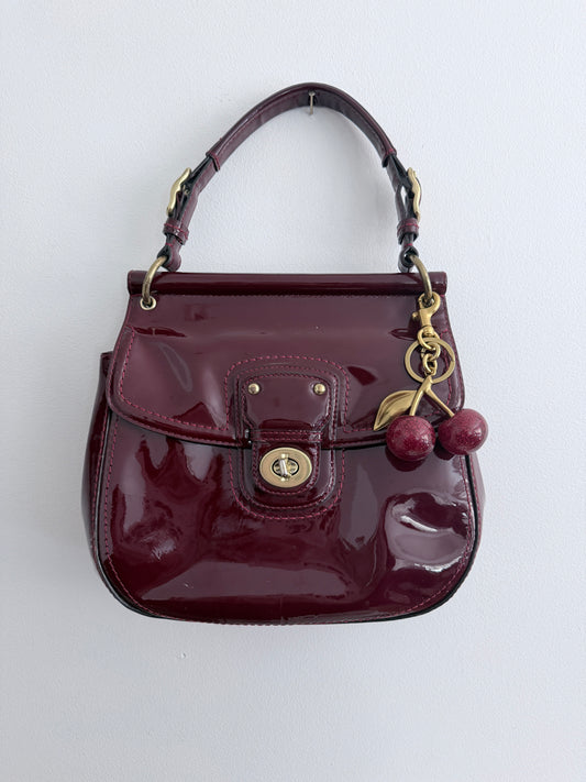 Coach Burgundy Patent Leather Turnlock Bag