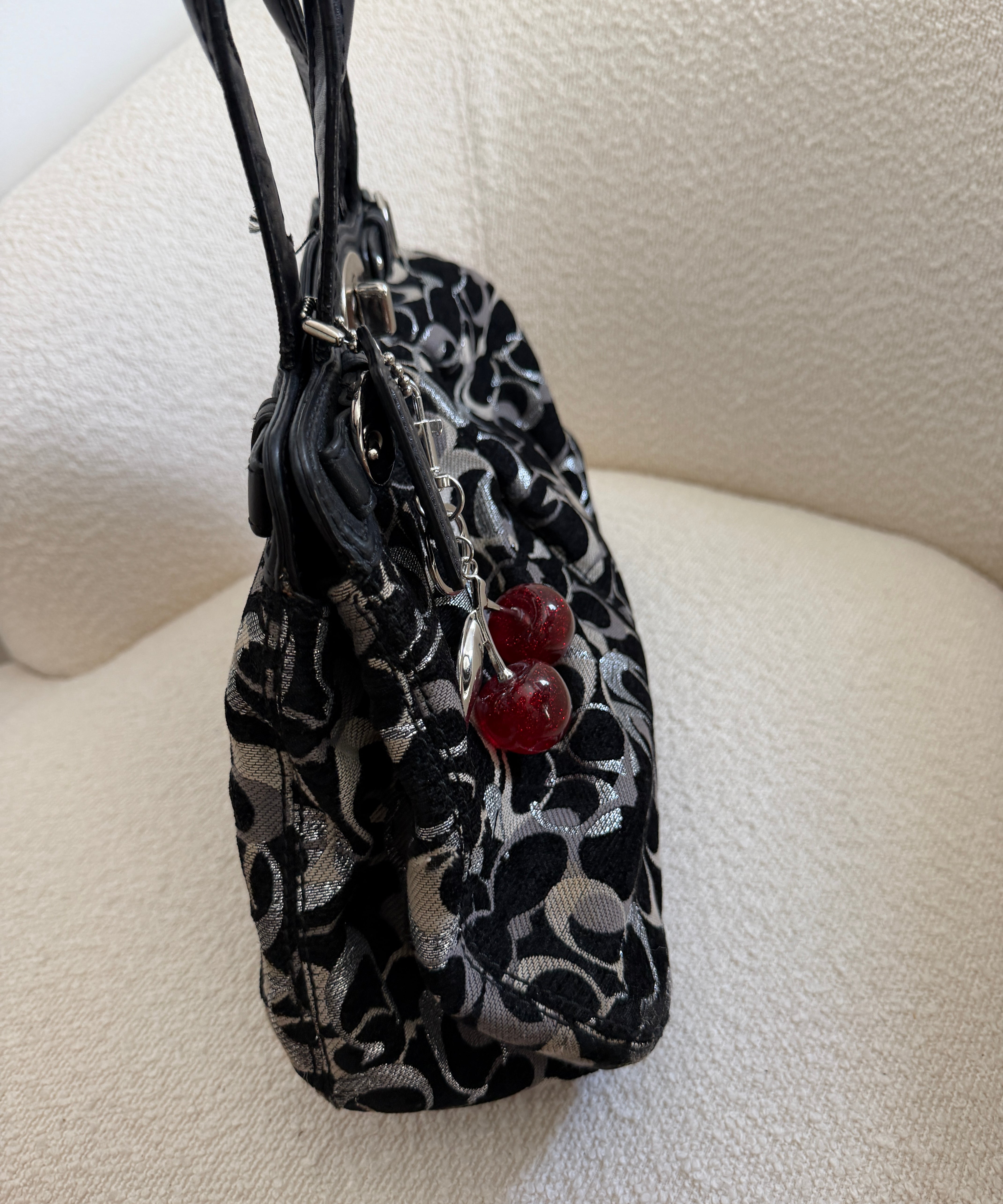 Black Optic Signature Coach Garnett Turnlock Bag