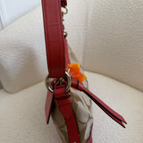 Brown Coach Signature Shoulder Bag with Orange Trim