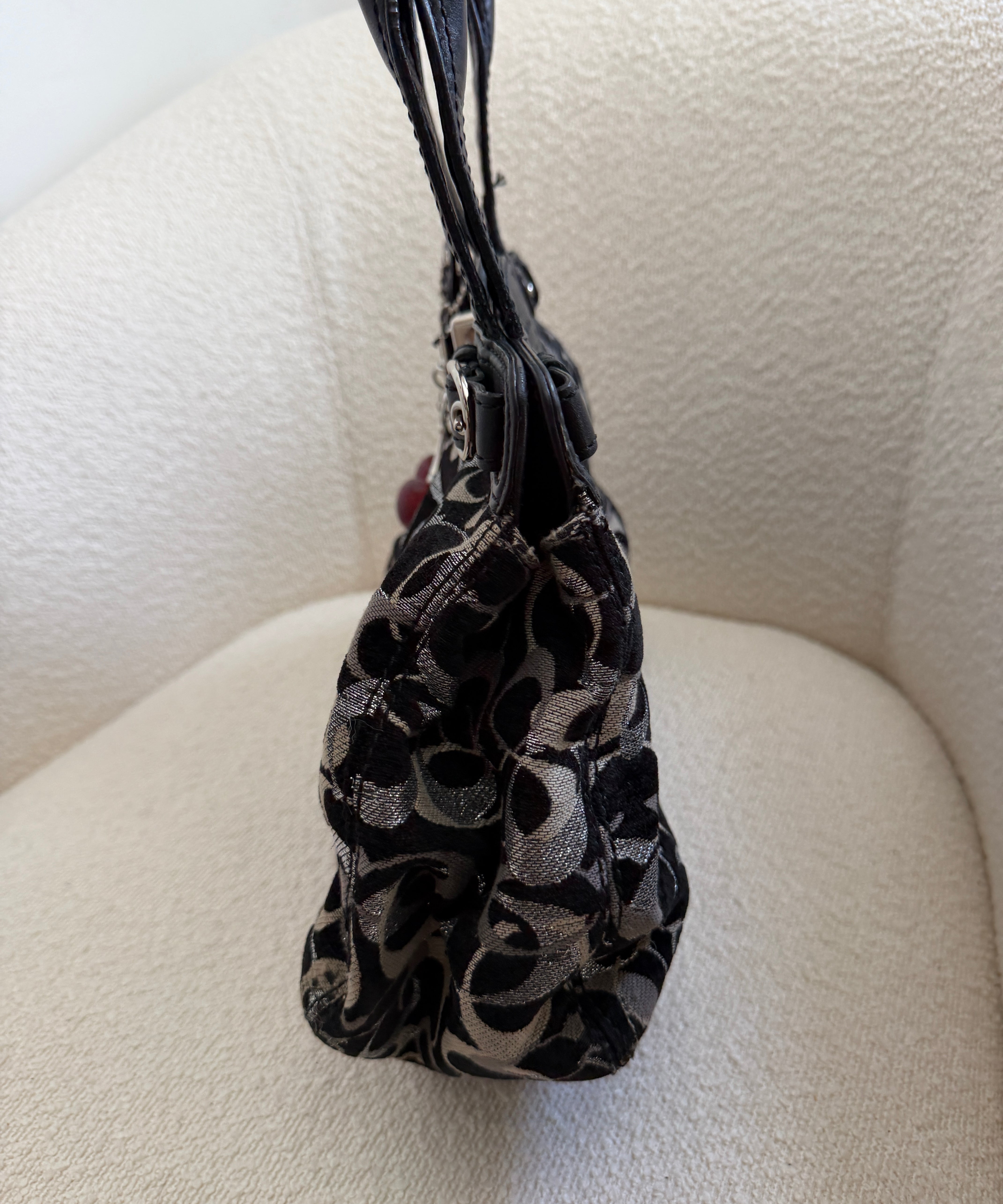 Black Optic Signature Coach Garnett Turnlock Bag