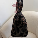 Black Optic Signature Coach Garnett Turnlock Bag
