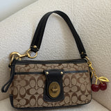 Coach Brown Signature Legacy Turnlock Bag
